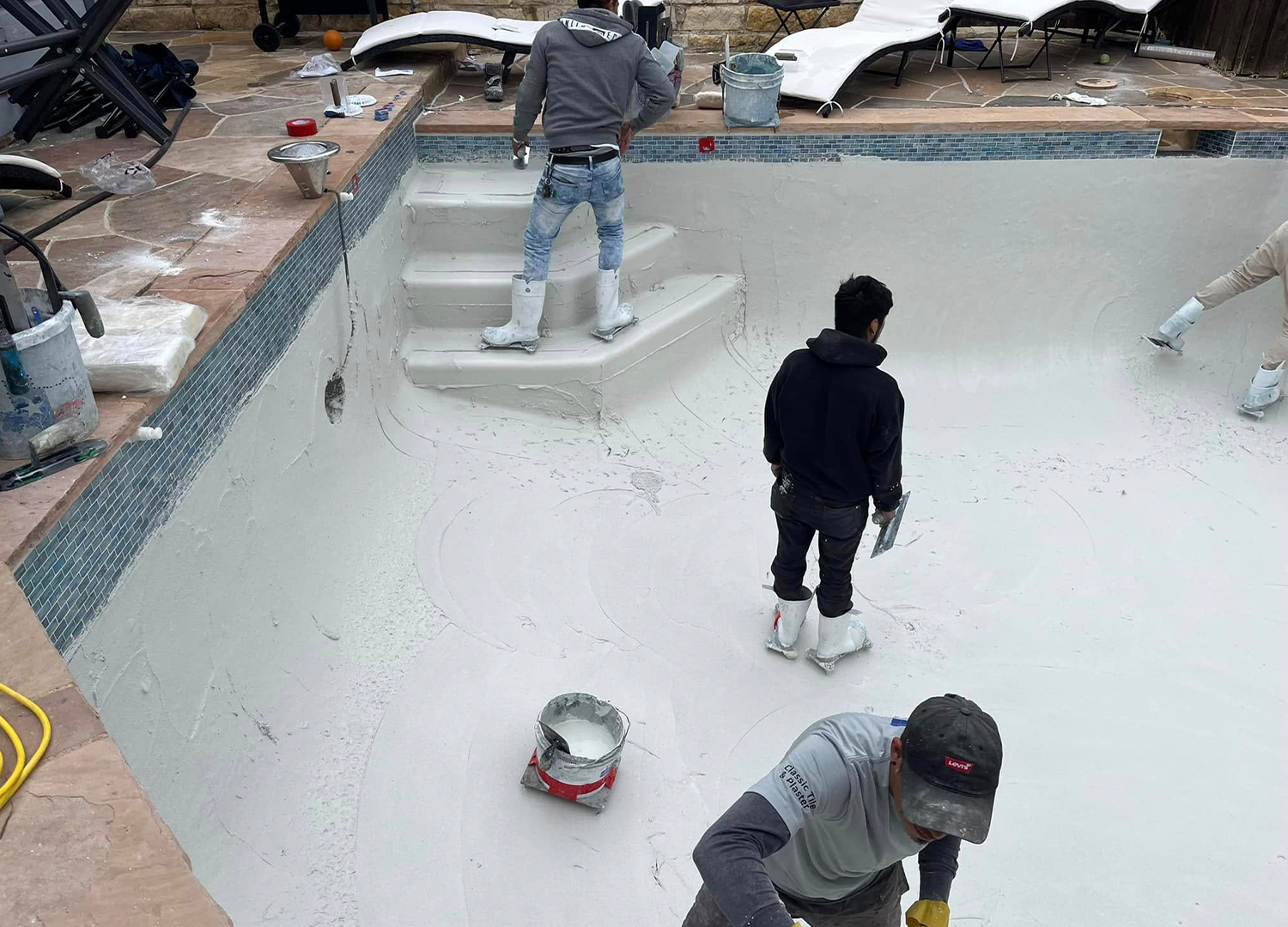 White Plaster Pool Transformation